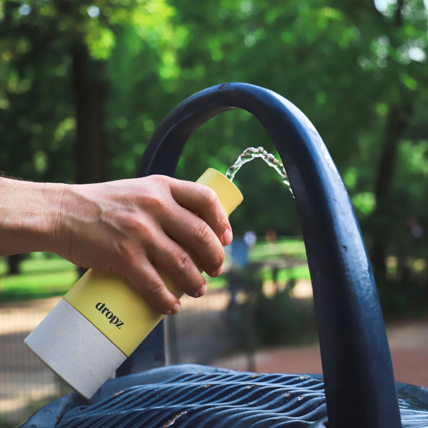 dropz Bottle yellow - 0.5 L with storage compartment